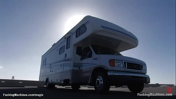 Natural busty blonde babe Kissy Kapri gets horny on the beach and she moves in her camper where fucks double penetration machine and vibrator solo